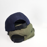 Back view of navy and olive Zest five-panel caps stacked showing adjustable straps