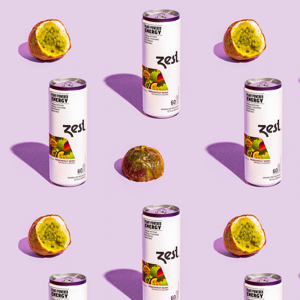 Zest Passionfruit Berry cans with halved passionfruit on purple background pattern